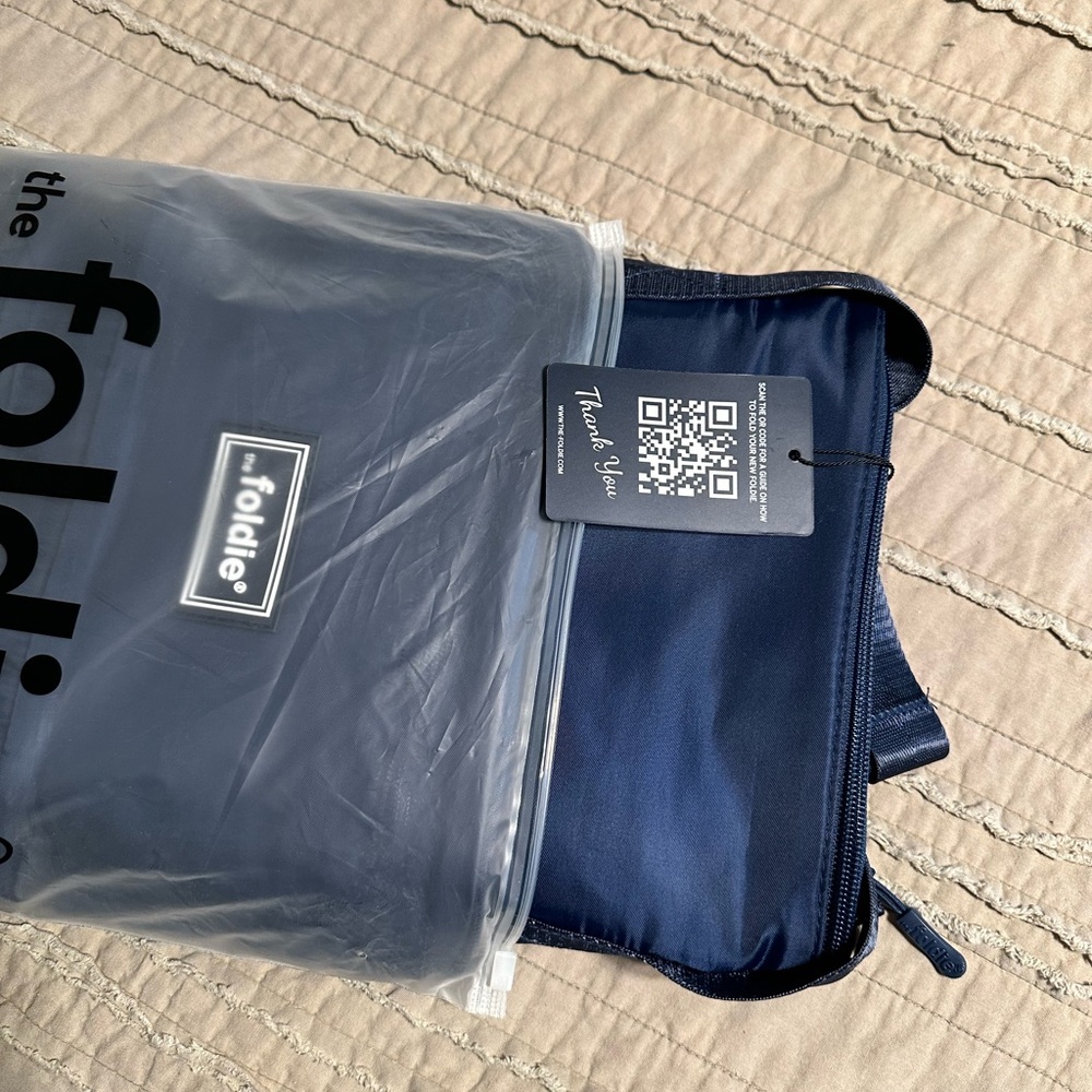 Original Foldie 5.0 Anti-theft Crossbody Bag. NWT. Dark blue.